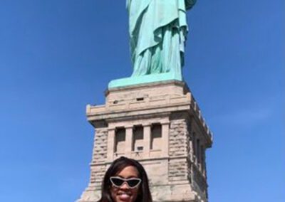 Courtney and Aria at the Statue of Liberty