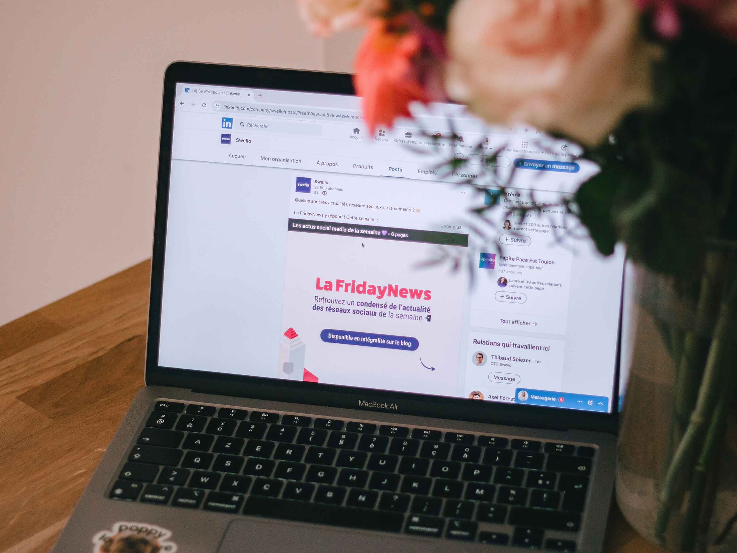 Laptop featuring Linkedin timeline on the screen